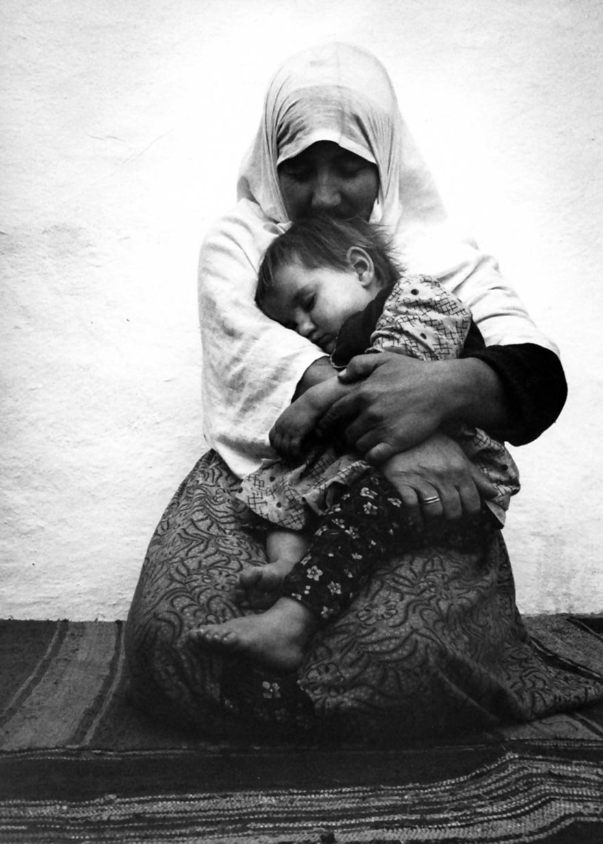 фото матери с ребенком кена хеймана